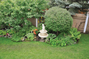 Neatly clipped bushes add to the regal flair.