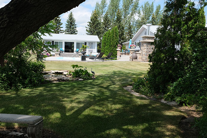 Looking back on the pool house, left, and people house, right.