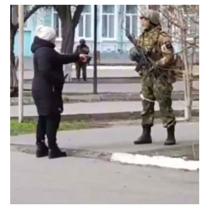 Ukrainian lady and Russian soldier